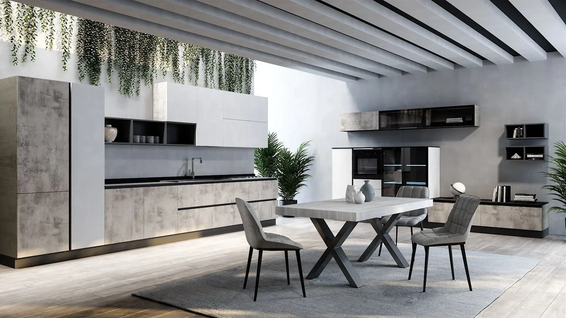 Cucina angolare Dafne Grey di BEHOME con mobili grigio cemento, pensili bianchi, tavolo centrale e tre sedie.