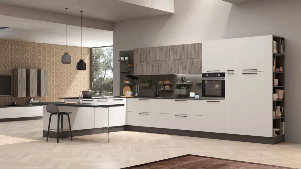 Cucina Con Penisola Ines Top: basi bianche, pensili in legno, piano snack con gamba in vetro e colonne con vani a giorno.