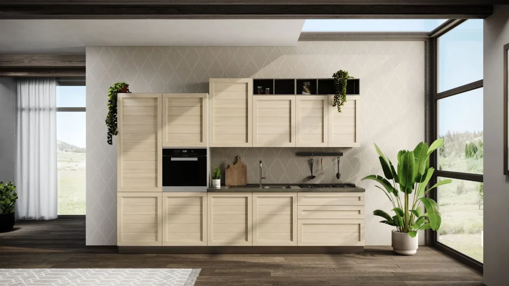 Luminosa Cucina Moderna Glenda Lux lineare: ante in legno chiaro a doghe, top scuro, forno a incasso e pianta decorativa.
