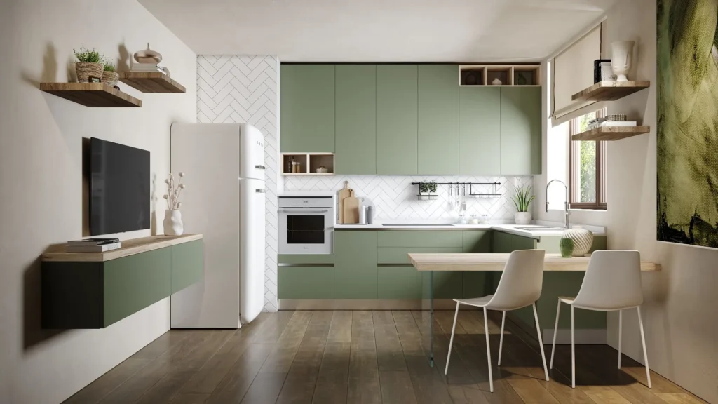 Cucina con penisola Dafne Green di BEHOME: mobili verdi, frigorifero vintage, penisola in legno e sedie bianche.