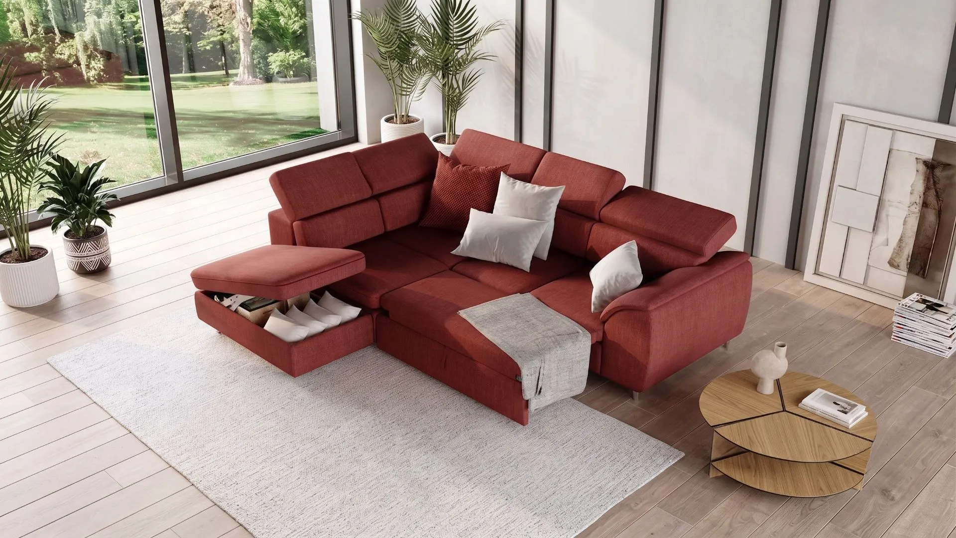 Divano angolare Vespro Red di BEHOME con seduta letto allungata e contenitore aperto.