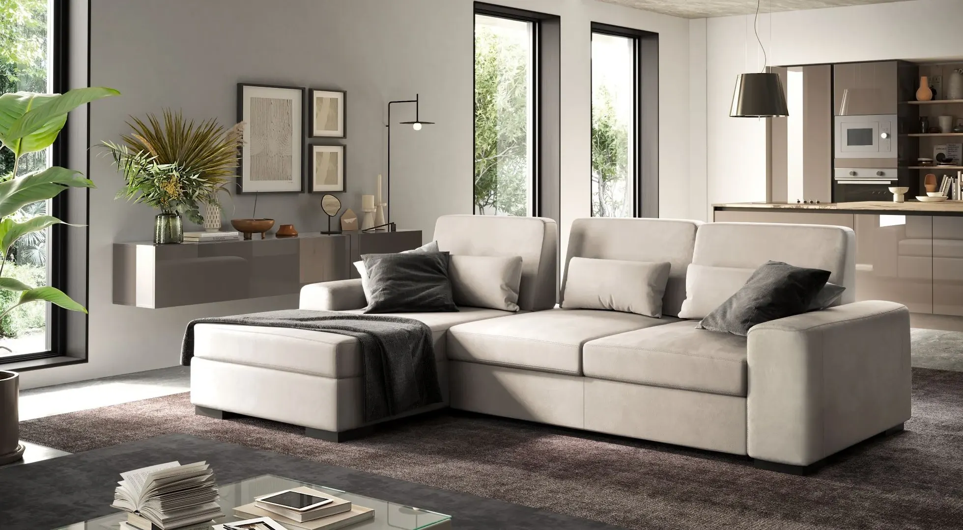 Divano con chaise longue Astra di BEHOME in tessuto chiaro in un soggiorno moderno.