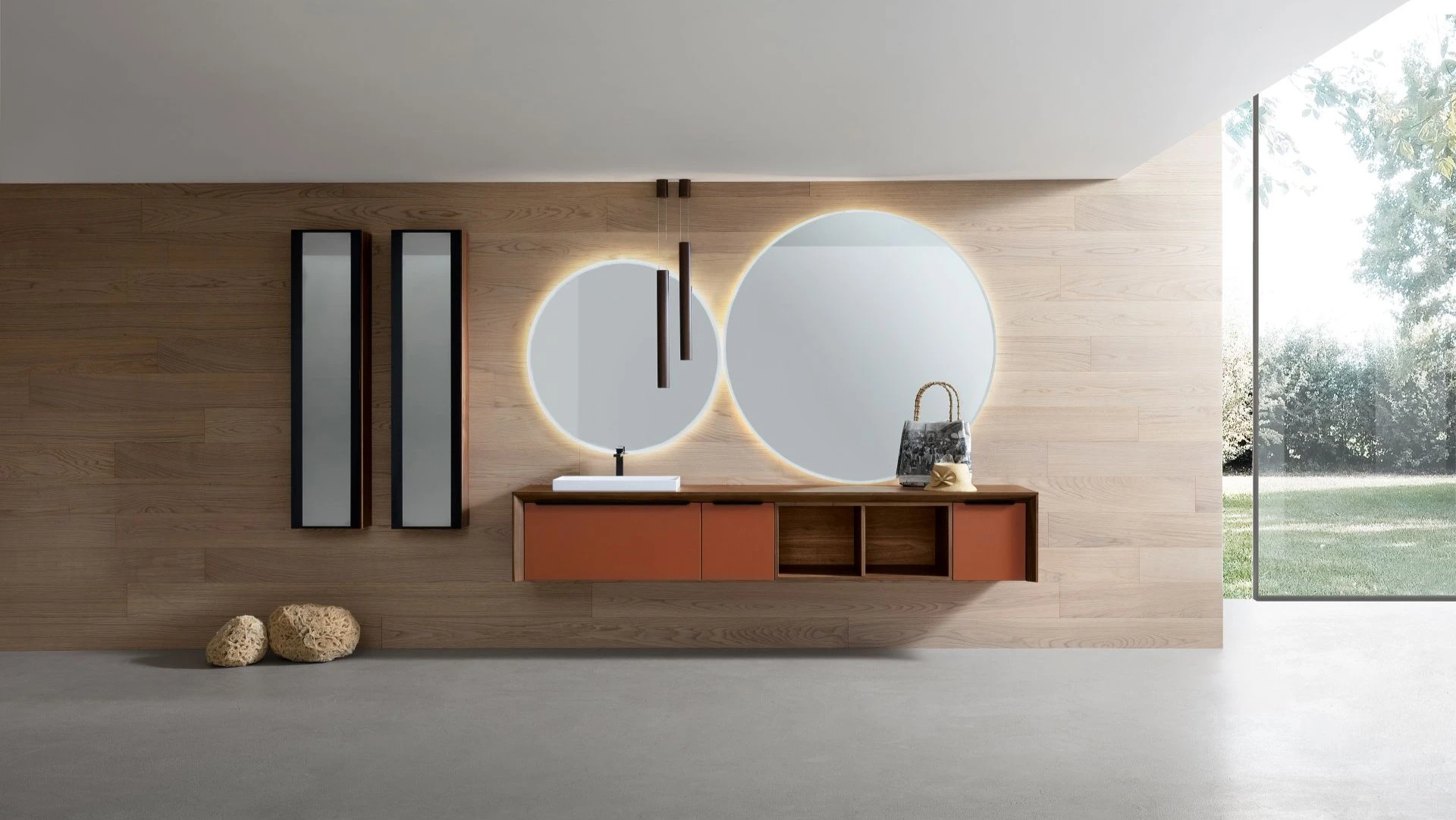 Mobile bagno sospeso Remo di BEHOME color terracotta con doppi specchi rotondi.